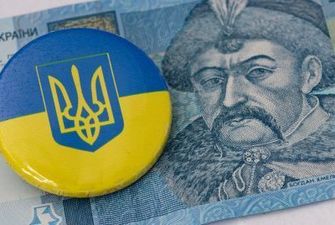 Підробив паспорт і хотів зняти 23 млн чужих грошей в банку: у Києві викрили шахрая