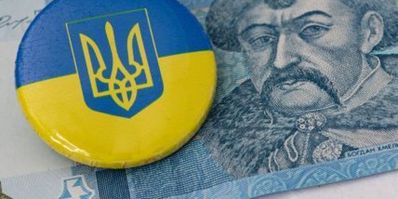 Подделал паспорт и хотел снять 23 млн чужих денег в банке: в Киеве разоблачили мошенника