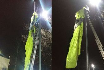 У Києві чоловік стрибнув з багатоповерхівки з парашутом і повис на стовпі