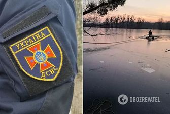 На Киевщине спасатели помогли мужчине с ребенком, которые оказались на понтоне посреди замерзшей реки. Фото