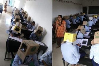 Щоб не списували: студентів в Індії змусили складати іспит з коробками на голові
