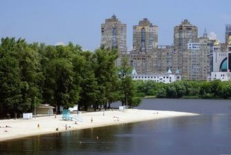 Будний день - не помеха: киевляне начали постепенно "оккупировать" пляжи столицы, эксклюзивные фото