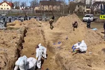 Застреленных жителей Бучи в братских могилах хоронил коммунальщик