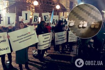 Принесли лапти и кричали "Вон!" В Киеве устроили митинг под посольством России. Фото и видео