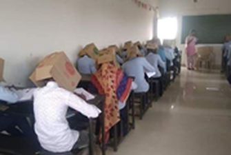 В Индии студенты сдавали экзамен с коробками на головах